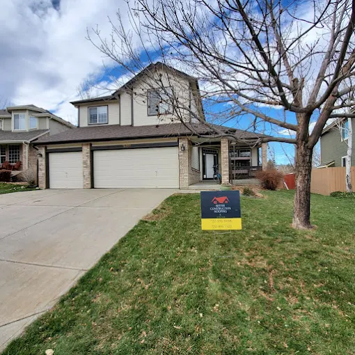 Asphalt shingle roof with chalk-marked hail impact area – Chicago Hail Claims roof damage example.