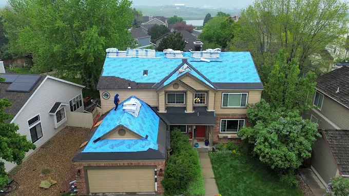 Drone roof inspection image used to document hail damage on asphalt shingles – Chicago Hail Claims.