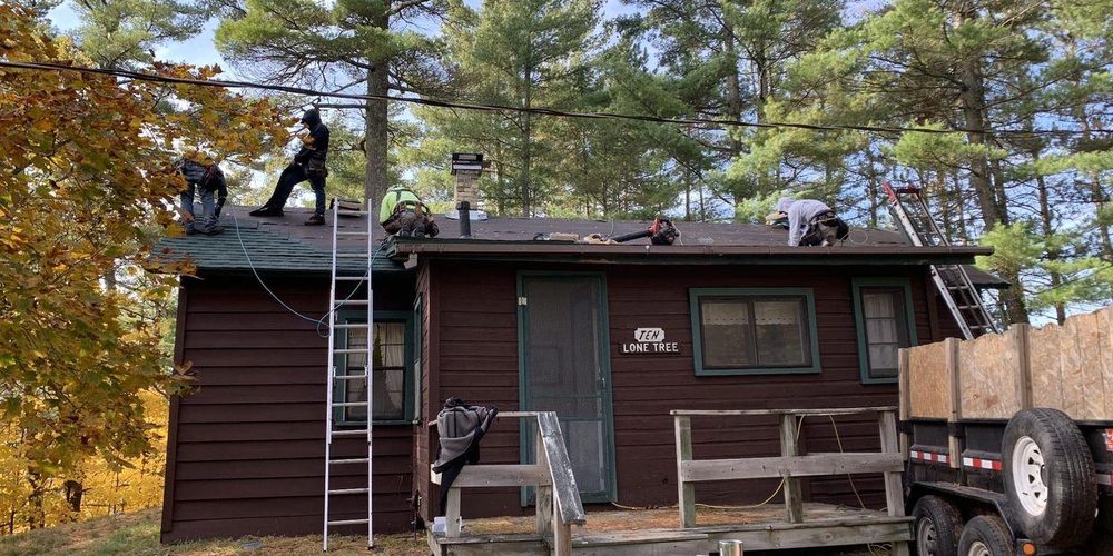 Roof and solar panel installation on residential home – Chicago Hail Claims hail damage and insurance claim support.